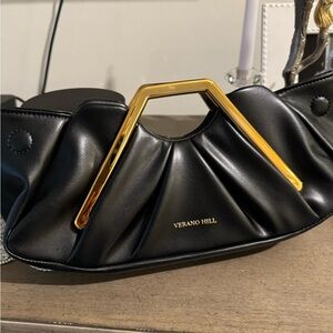 Verano Hill Black Leather Clutch with Gold Tone handle